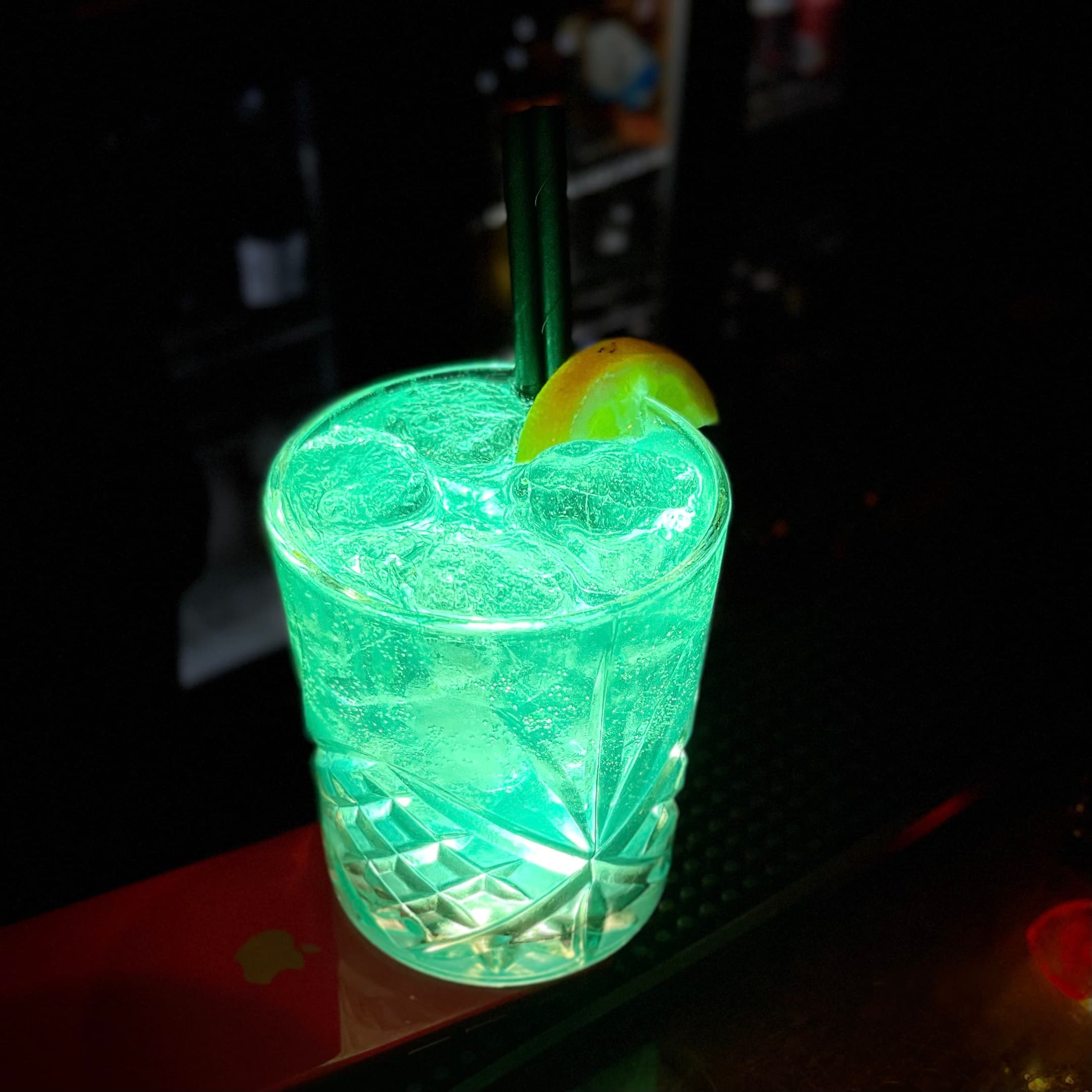 A glowing cocktail in the candlelit vaults